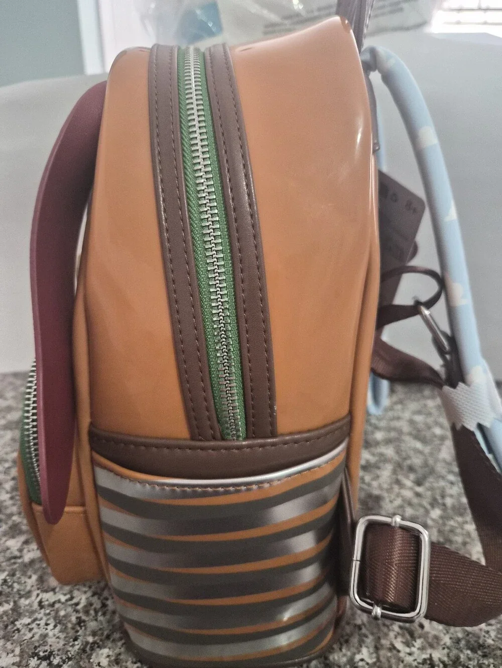 Loungefly Toy Story Slinky Mini Backpack with Maroon Ears and Green Trim